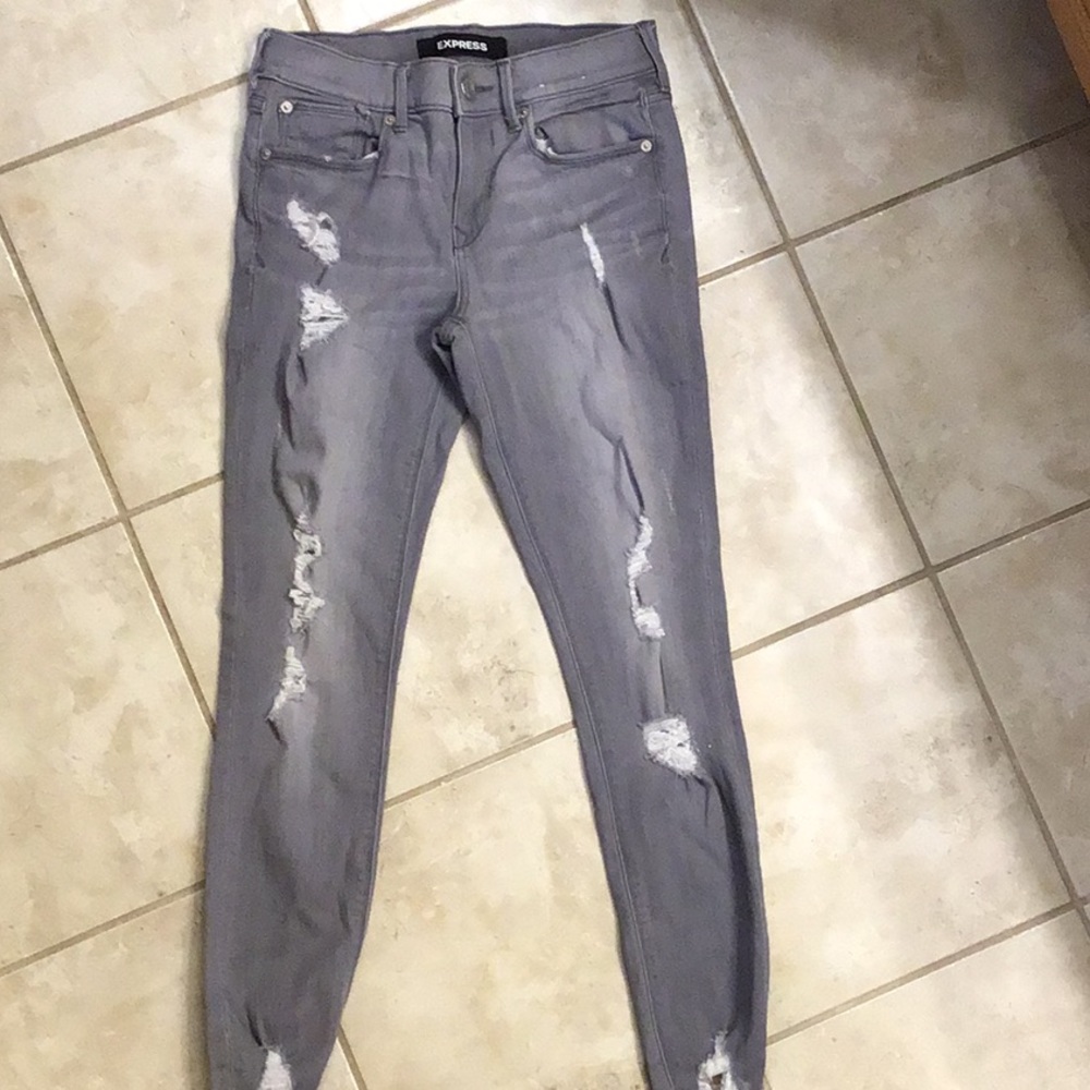NWOT. Express. Gray raw hem jean ankle leggings.
